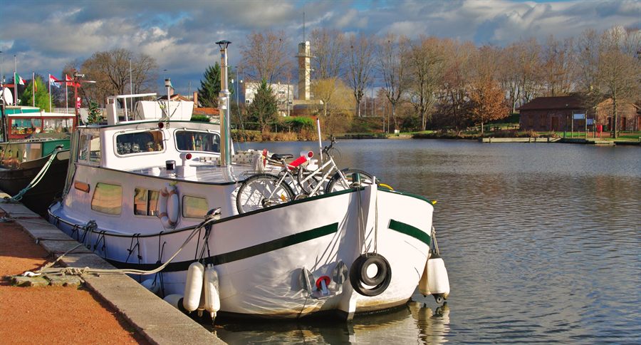 Small cruise barge with bicycles in Roanne, France