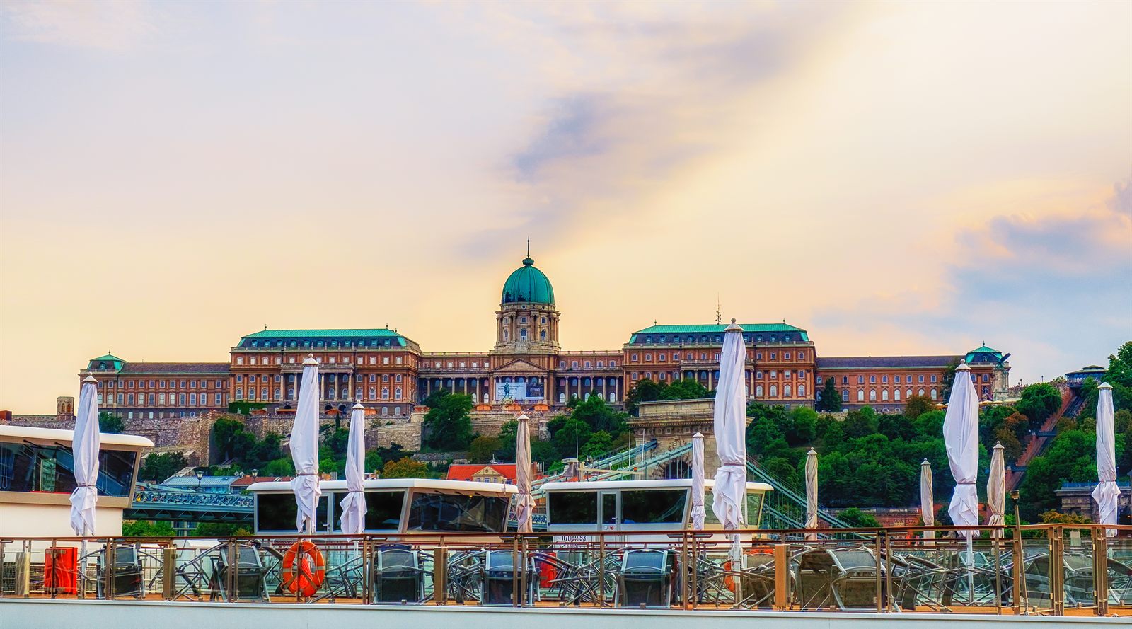 Sun deck of a river cruise ship facing Buda Castle